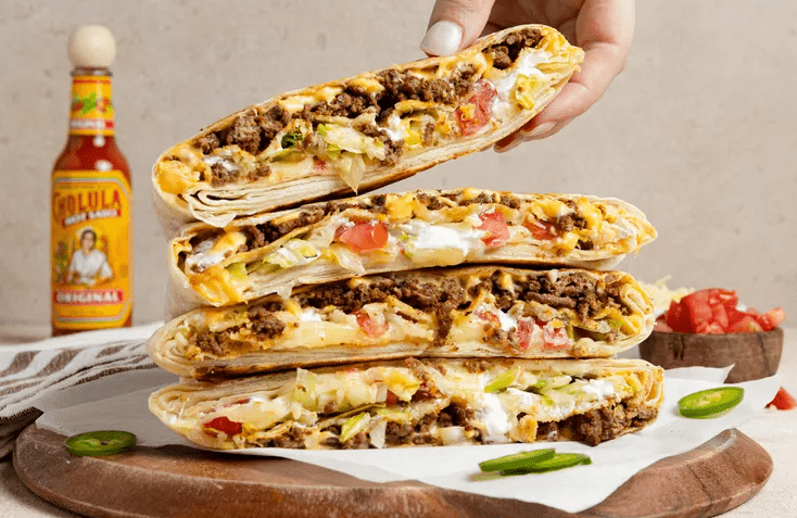 Homemade Crunchwrap Supremes stacked, ready for lunch or meal prep