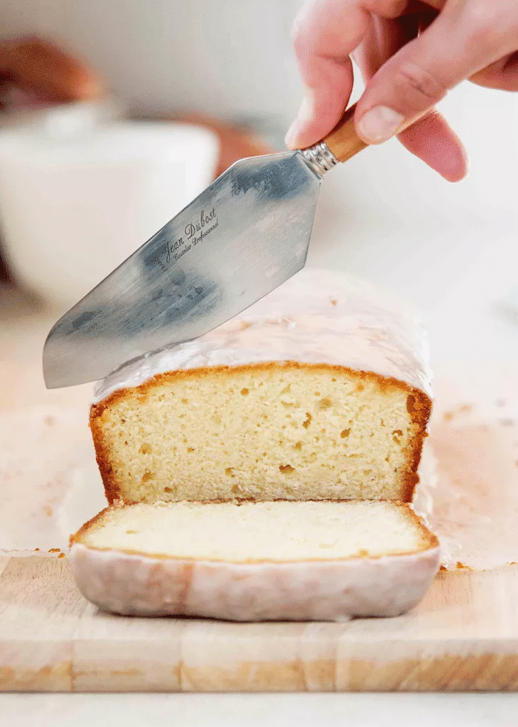 Slicing the ready Lemon Pound cake