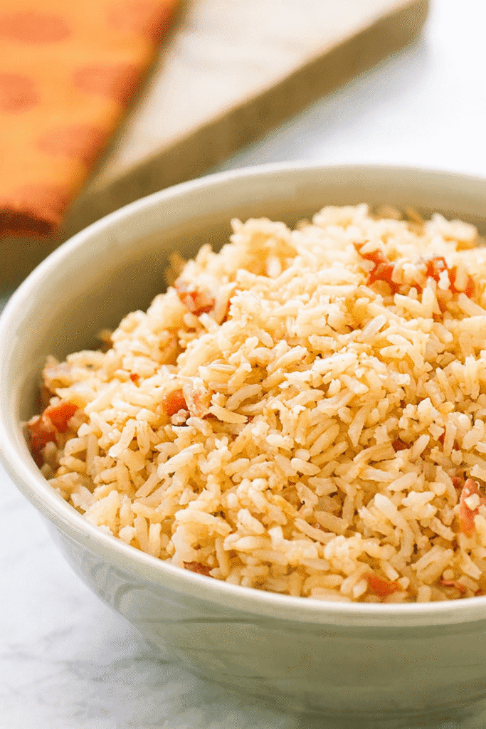 Authentic Mexican Spanish rice served in a rustic bowl with golden grains and tomato broth
